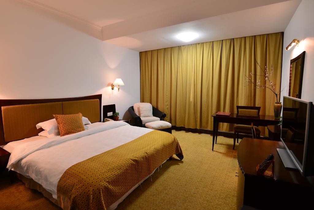 Baodao Exhibition Center Hotel Wuyishan  Chambre photo
