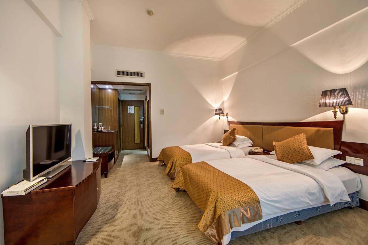 Baodao Exhibition Center Hotel Wuyishan  Extérieur photo